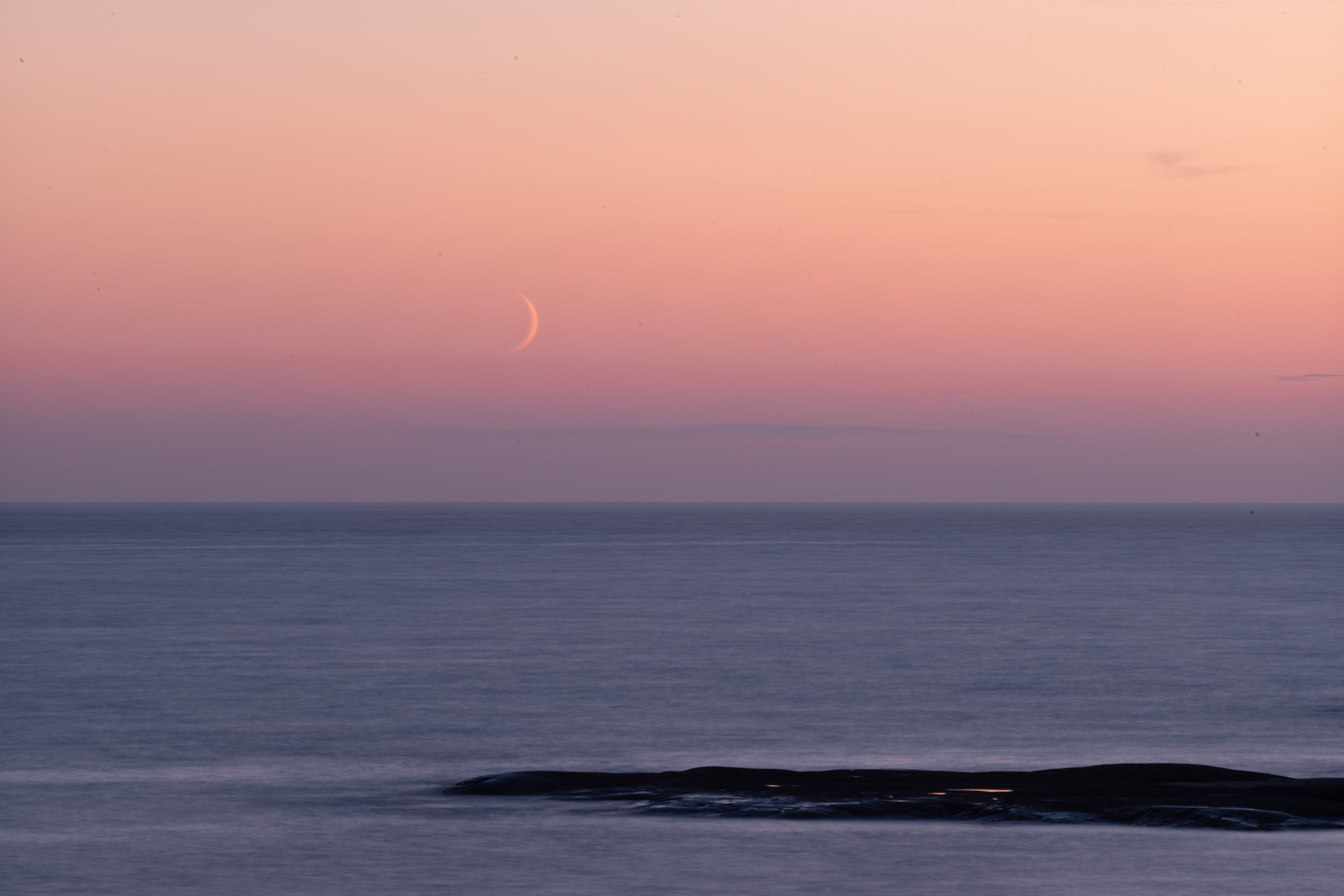 Moonset in Bohuslän at midsummer